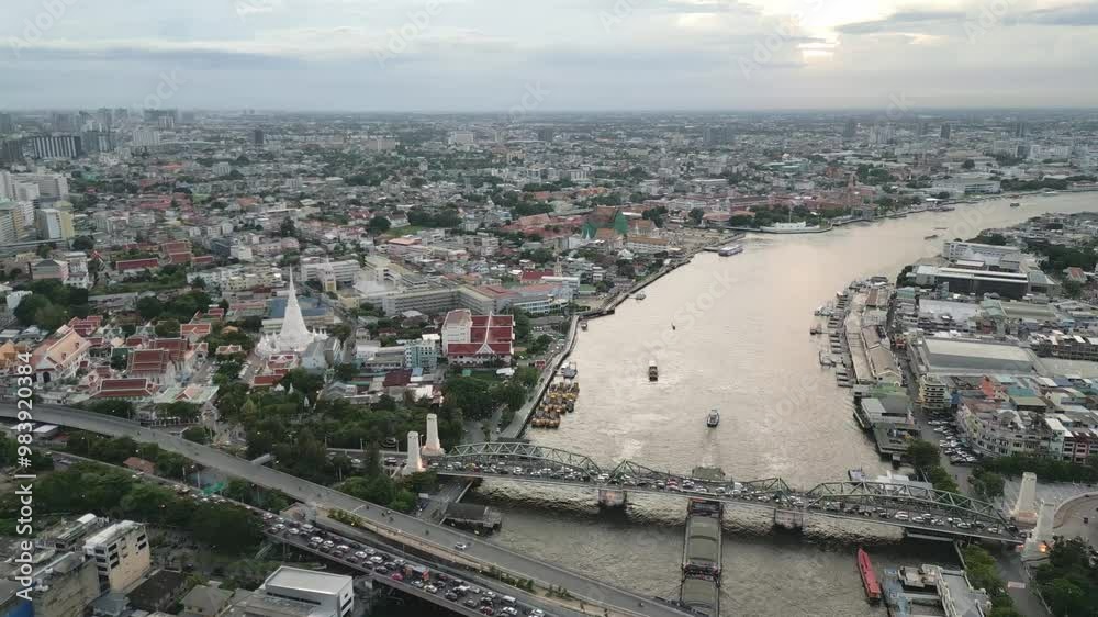Aerial view of Bangkok City of Thailand River bridge crosses urban area, skyline Aerial view of Bangkok City of Thailand River bridge crosses urban area, skyline