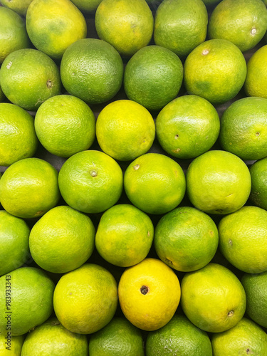 Fresh Orange Citrus fruit top view Background. Bunch of citrus fruits, Summer tray market agriculture farm full of organic fruits It can be used as background