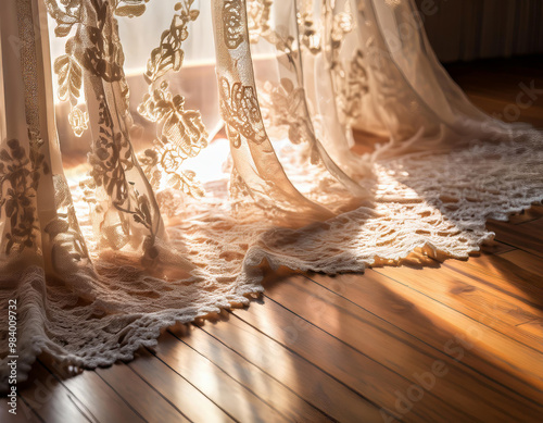 Sunlight shining through lace curtains onto hardwood floor creating warm home interior feeling