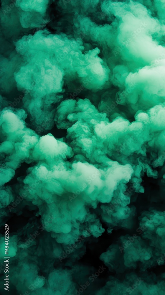 A swirling cloud of green smoke on a dark background, creating a mystical atmosphere. A swirling cloud of green smoke on a dark background, creating a mystical atmosphere.