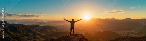 A man standing on a cliff edge, arms wide open, facing the horizon, symbolizing freedom and new beginnings.