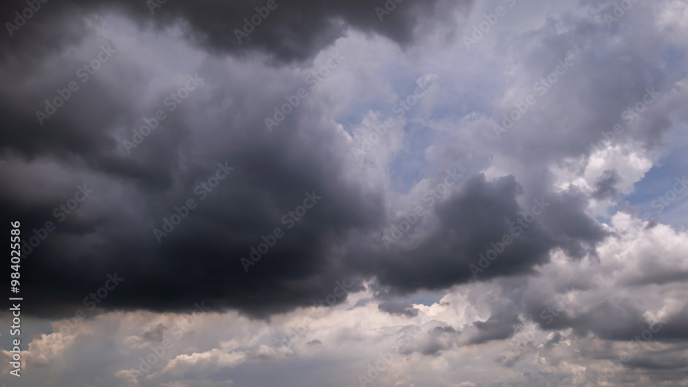 Dark sky with stormy clouds. Dramatic sky rain,Dark clouds before a thunder-storm. Dark sky with stormy clouds. Dramatic sky rain,Dark clouds before a thunder-storm.