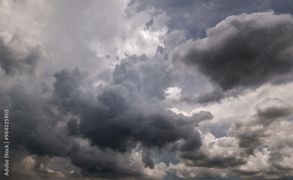 Dark sky with stormy clouds. Dramatic sky rain,Dark clouds before a thunder-storm. Dark sky with stormy clouds. Dramatic sky rain,Dark clouds before a thunder-storm.
