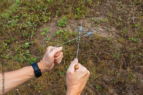Modern dowsing with a metal wire in your hands. Search and study of geopathogenic and anomalous zones. An ancient method unproven by science and a modern tool