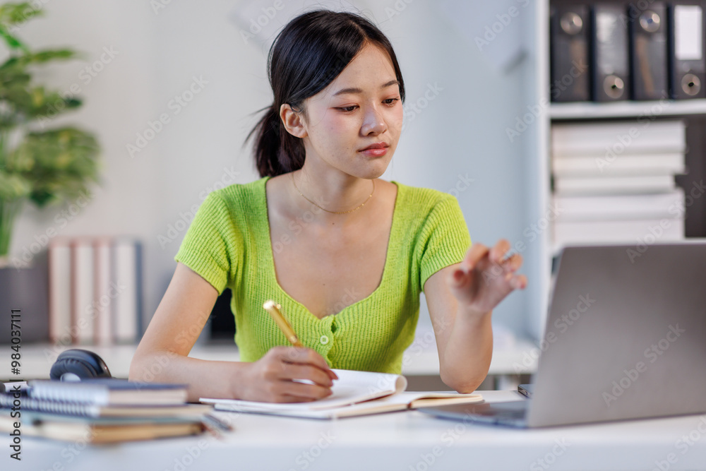 Online Lesson. Smiling Young asian woman Using Laptop And Taking Notes While Sitting At Desk At Home, Smiling asian female Enjoying Remote Education And Distance Learning, Free Space
Online Lesson. Smiling Young asian woman Using Laptop And Taking Notes While Sitting At Desk At Home, Smiling asian female Enjoying Remote Education And Distance Learning, Free Space