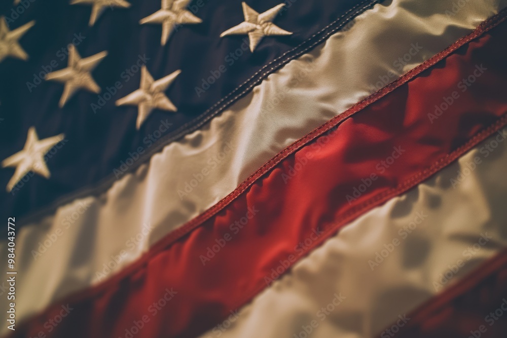 Fototapeta premium A close-up of an American flag with its stars and stripes prominently displayed