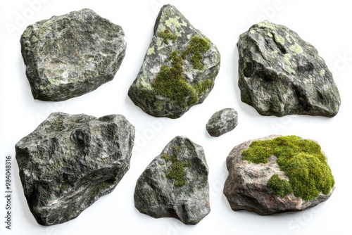 A collection of rugged, moss-covered rocks set on a white background