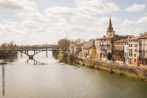 Lot river with old bridge and town, Montauban, Lot, Occitanie, France photo