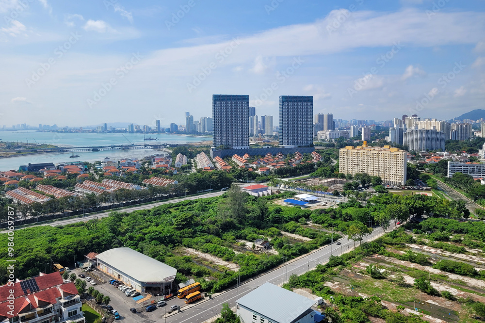 Fototapeta premium Aerial view Straits Quay and residential housing area and commercial buildings at Tanjung Tokong, Penang. 