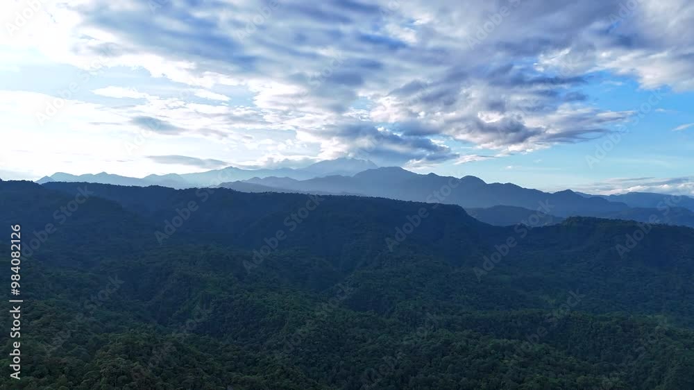 Hyperlapse aerial dolly of Mindo's cloud forest, featuring mist moving over the trees and mountains in Ecuador with stunning clouds across sky Hyperlapse aerial dolly of Mindo's cloud forest, featuring mist moving over the trees and mountains in Ecuador with stunning clouds across sky