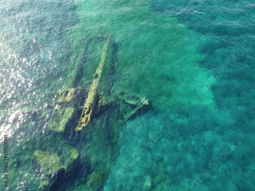 Vista aerea di un relitto sommerso nel mare della Sardegna photo