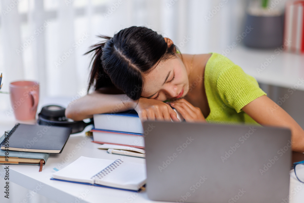 Young woman working on laptop having headache. Bored workaholic female accountant employee with headache and stress. Business asian woman with migraine, stress relief, chronic pain
Young woman working on laptop having headache. Bored workaholic female accountant employee with headache and stress. Business asian woman with migraine, stress relief, chronic pain