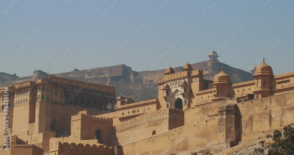 Jaipur, Rajasthan, India. General View Of Amber Fort. Wall And Towers Of Amer Fort Or Amber Fort, Amer. Amer Palace Is Great Example Of Rajput Architecture. Amber Fort Principal Tourist Attraction In Jaipur, Rajasthan, India. General View Of Amber Fort. Wall And Towers Of Amer Fort Or Amber Fort, Amer. Amer Palace Is Great Example Of Rajput Architecture. Amber Fort Principal Tourist Attraction In