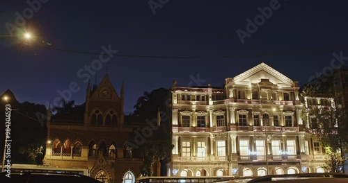 Mumbai, India. Heritage Structure Called Army And Navy Building In Night Illumination. Located In Art District Of Kala Ghoda In Mumbai. Today, Army And Navy Building Houses Various Companies Of Tata photo