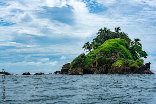 Tropical Island in Panama Surrounded by Pristine Ocean, Featuring Stunning Cliffs, Lush Greenery, Exotic Wildlife, and Caribbean Scenery, Ideal for Nature Lovers, Travel, and Adventure Photography photo