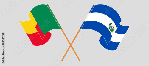 Crossed and waving flags of Benin and Republic of El Salvador. Vector illustration