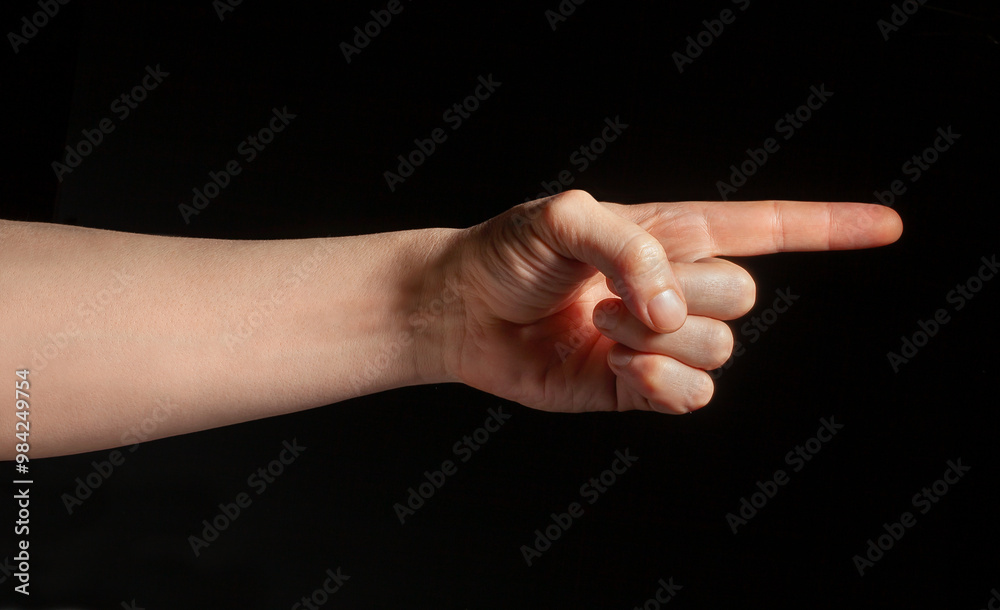 pointed index finger hand gesture on black background pointed index finger hand gesture on black background