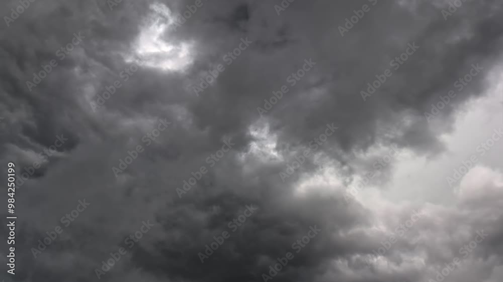 A stormy sky with dark clouds on a summer day.