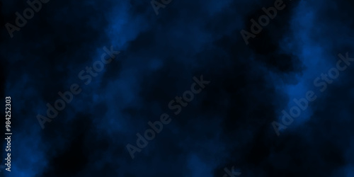 Blue smoke in dark background.Texture and desktop picture. blue texture with colorful smoke, decorative and blurry and grunge blue paper texture, Colorful blue textures for making flyer and poster.	

