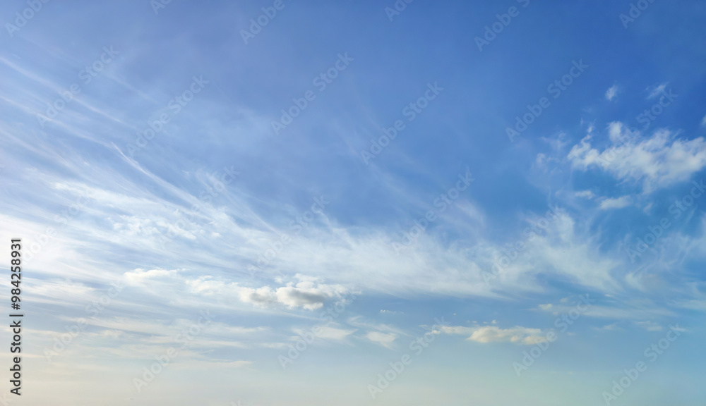 Expansive Blue Sky with Soft Clouds for Serenity and Inspiration Expansive Blue Sky with Soft Clouds for Serenity and Inspiration