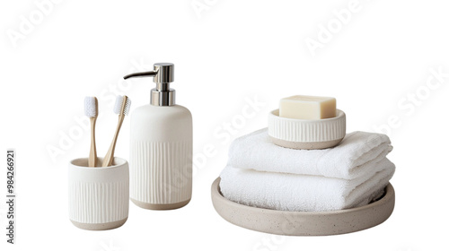 A white towel is stacked on top of another white towel