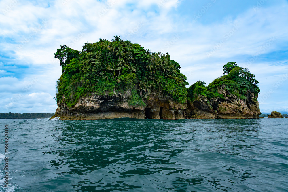 Tropical Paradise of Isla de los Pájaros, Panama, A Scenic Haven with Lush Vegetation, Wildlife, and Exotic Coastal Rock Formations in the Caribbean Sea Tropical Paradise of Isla de los Pájaros, Panama, A Scenic Haven with Lush Vegetation, Wildlife, and Exotic Coastal Rock Formations in the Caribbean Sea