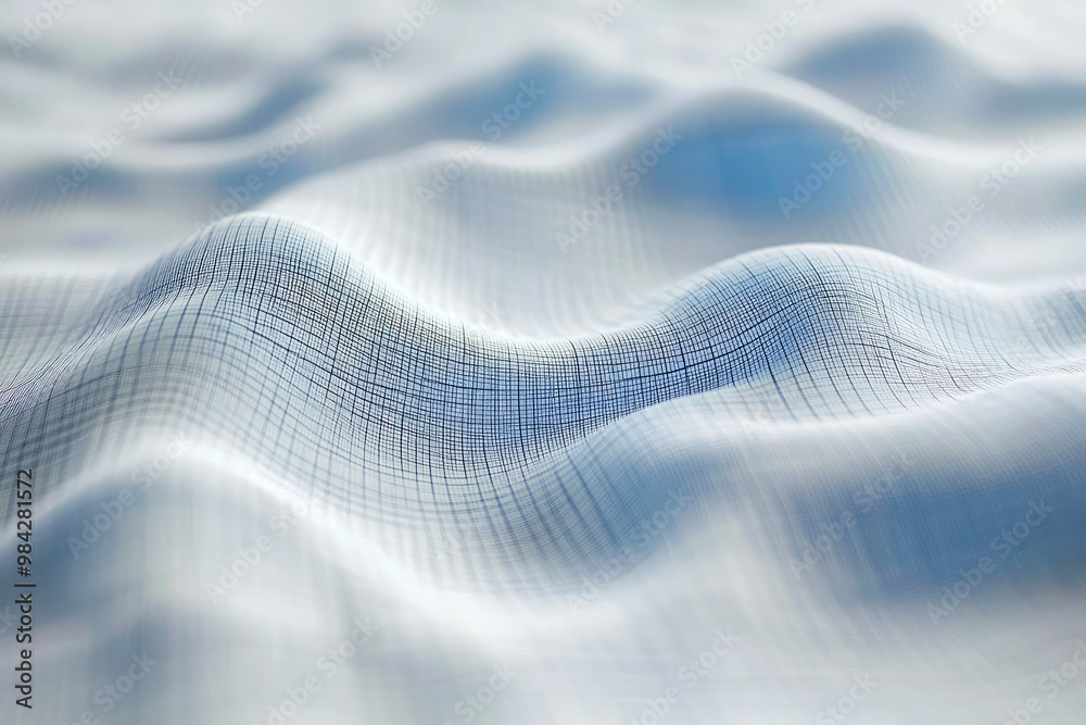 Abstract blue waves composed of delicate mesh creating a flowing and dynamic visual that evokes a sense of movement and grace.