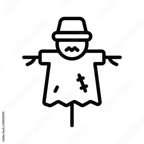 A scarecrow, protecting the garden from birds and pests