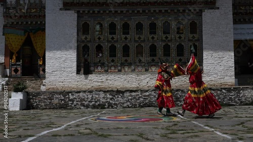 Mask dancers at the annual Ura Yakchoe festival, Bumthang, Ura, Bhutan photo