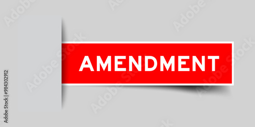 Red color square shape sticker label with word amendment inserted in gray background
