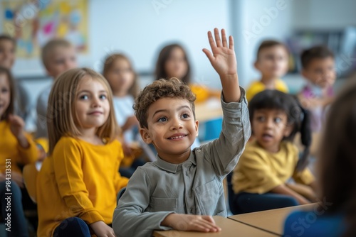 Cheerful diverse primary school children students in modern light classroom with one hand up to asnwer teacher's question