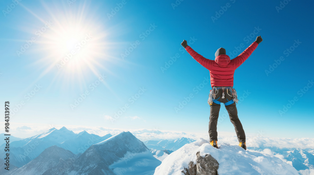 A person stands triumphantly on a mountain summit, arms raised in celebration under a bright sun A person stands triumphantly on a mountain summit, arms raised in celebration under a bright sun