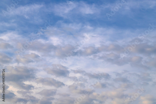 Beautiful blue sky with white Altocumulus undulatus clouds.