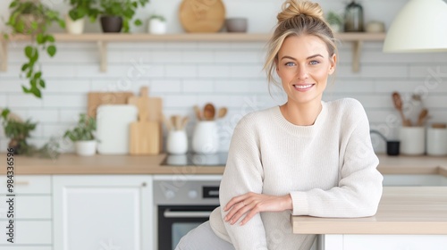 Young Businesswoman of European American Descent in Her Modern Minimalist White Kitchen