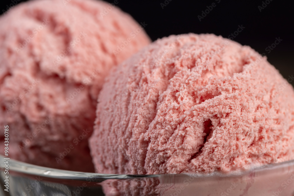 red strawberry-flavored ice cream in a glass bowl red strawberry-flavored ice cream in a glass bowl