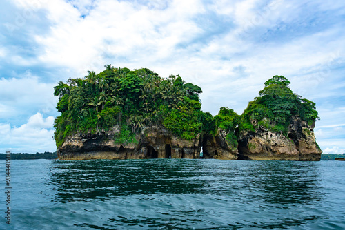 Stunning Tropical Scenery of Isla de los Pájaros in Bocas del Toro, Panama Featuring Lush Vegetation, Wildlife, and Dramatic Coastal Rock Formations in the Caribbean Sea photo