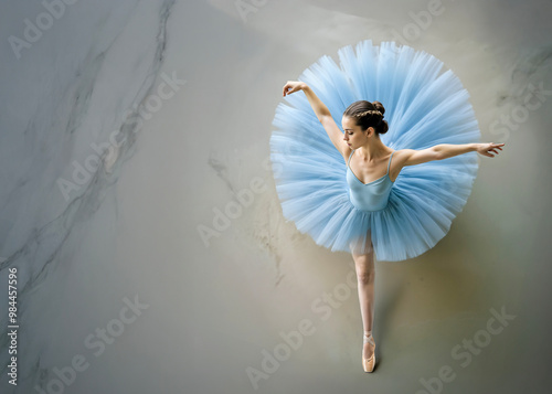 A young ballerina performs during rehearsal