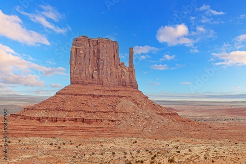 Panoramic picture of the glowing red geological sandstone formations in Monument Valley