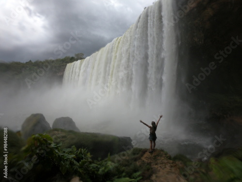 silhueta de mulher no salto belo, em campo novo do parecis, mato grosso  photo