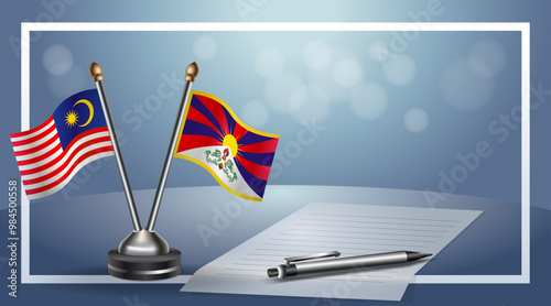 Malaysia and Tibet Small national flag on bokeh background, cooperative relationship