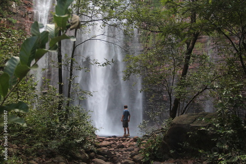 homem na cachoeira dos namorados, parque estadual da serra de ricardo franco, vila bela da santíssima trindade, mato grosso  photo