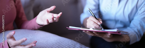 Fotografie Stressed asian patient women with anxiety explaining about psychological health