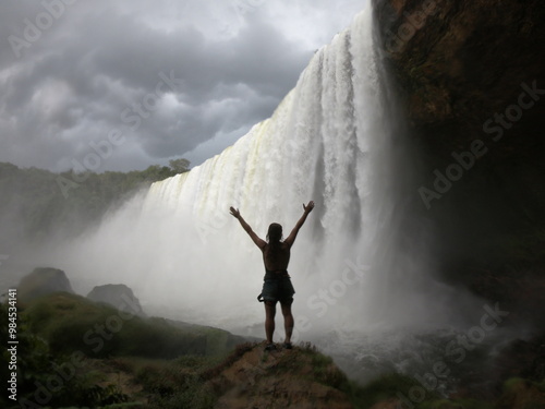 silhueta de mulher na cachoeira salto belo em campo novo do parecis, mato grosso  photo