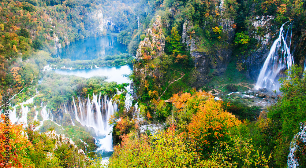 Picturesque autumn waterfall in Plitvice lakes