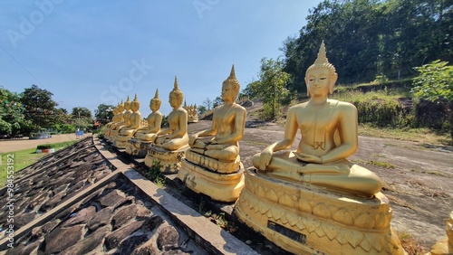 The golden Buddha statues of Phu Salao temple in Pakse city, Champasak, Laos
 photo