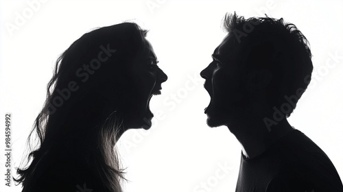 Silhouette profiles of man and woman facing each other, mouths open in heated argument or passionate discussion against white background.