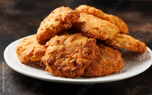 Homemade Cheddar Cheese Biscuits on a white plate