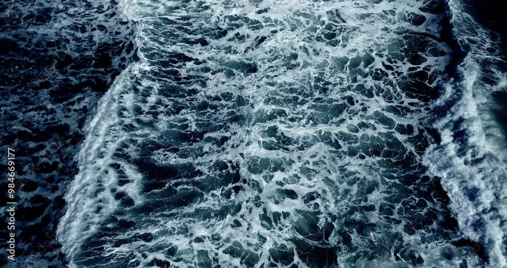 Top-view sea waves (Big power sea ocean wave Dark blue) Cinematic scene aerial view drone flying top-down of sea water big wave. Shot on cinema cam. DCI4K 4096x2160p. High quality footage ProRes422