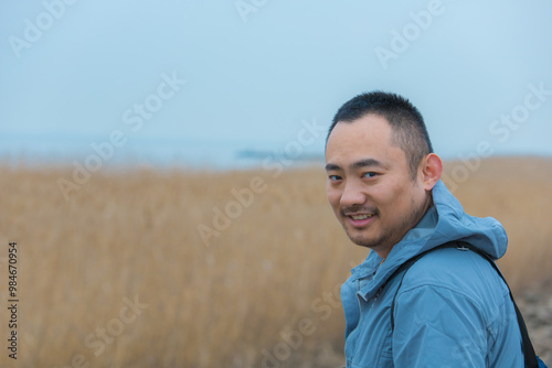 Chongming District, Shanghai - Young people on the beach under the blue sky