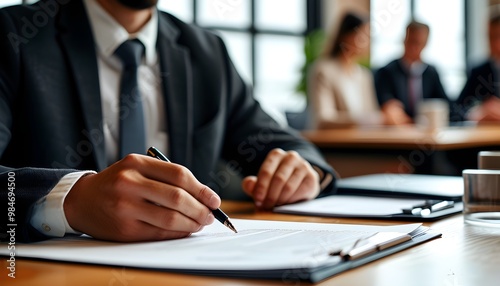 Contract signing in modern corporate office, anonymous professional engaged in negotiation at desk, emphasizing business agreements and decision-making process